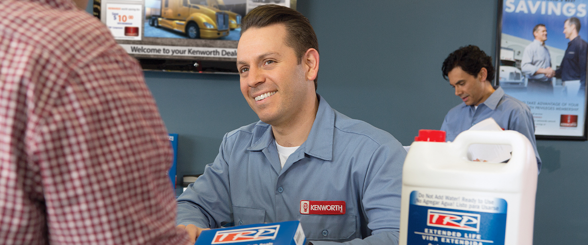 Kenworth employee interacting with customer