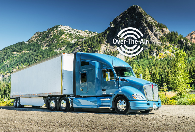 T680 parked in front of mountain with Over-The-Air logo